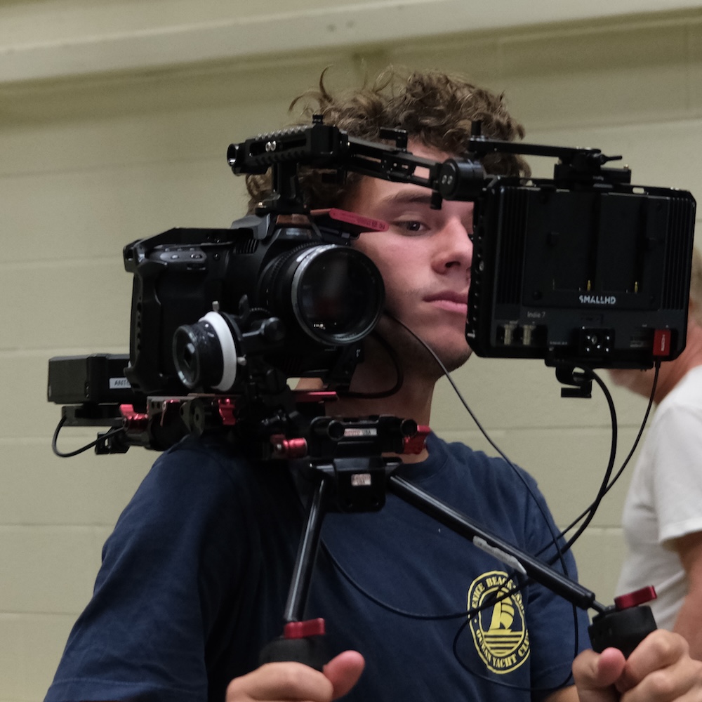 Student operating camera in CA659.